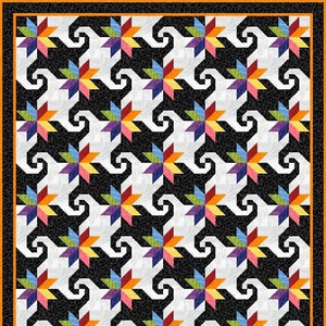 May include: A colorful quilt with a repeating pattern of black, white, and multi-colored stars. The stars are arranged in a spiral pattern.