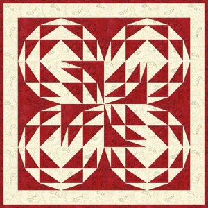 May include: A red and white quilt block with a geometric pattern. The block is made up of triangles and squares, and it has a circular design in the center.