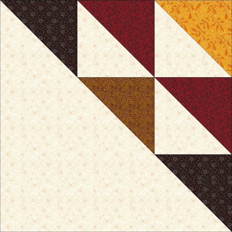 May include: A patchwork quilt block featuring a repeating pattern of triangles and squares. The design incorporates cream, burgundy, gold, and brown fabrics with floral and geometric patterns. The block is a square, showcasing a symmetrical arrangement.