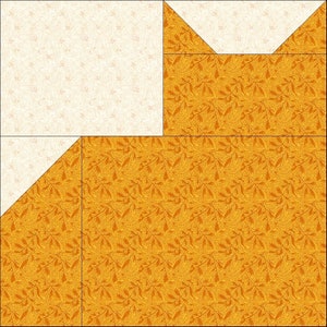 May include: A patchwork quilt block featuring a geometric design. The block is composed of cream and golden-yellow fabric pieces. The yellow fabric has a leaf pattern. The block is divided by black lines.