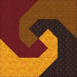 May include: A geometric quilt design featuring a spiral pattern. The quilt incorporates various fabrics in shades of red, gold, brown, and dark brown. The fabrics have floral and geometric patterns. The quilt is made of multiple fabric pieces sewn together.