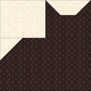 May include: A square quilt block pattern featuring a combination of dark brown fabric with a small white floral print and a light cream fabric with a subtle tan pattern. The design includes geometric shapes with triangular and rectangular sections.