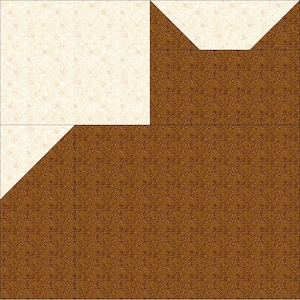 May include: A square quilt block pattern featuring a combination of cream fabric with a subtle leaf print and dark brown fabric with a detailed floral vine pattern. The design includes geometric shapes arranged in a block layout.