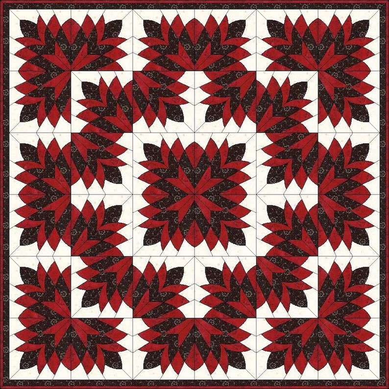 May include: A quilt with a repeating floral pattern in red and black on a white background. The quilt is framed with a red and black border. The floral design is symmetrical and geometric.