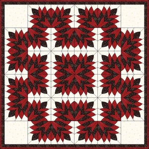 May include: A square quilt featuring a repeating floral pattern in shades of red and dark brown against a cream background. The quilt is bordered with a dark red and cream floral pattern. The design is symmetrical and geometric.
