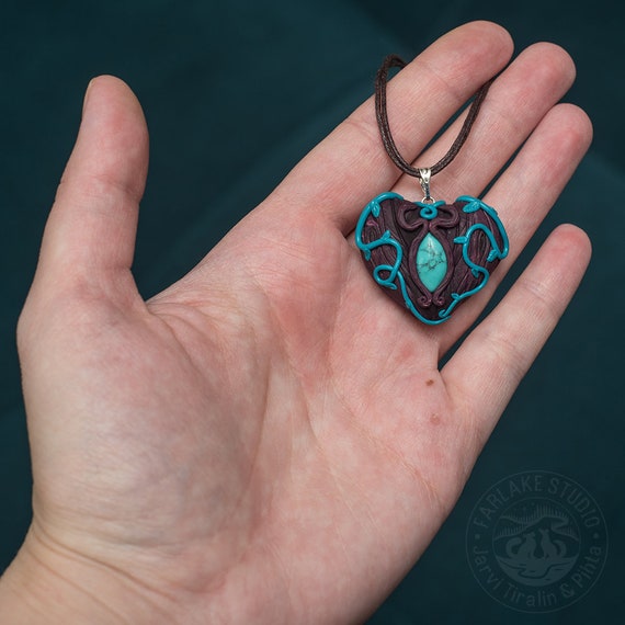 2 Feather pendant imitation turquoise silver tone B327