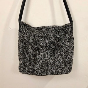 New York & Co - A black and white crocheted zippered handbag with a roomy interior, simple design - a great looking  every day bag for your