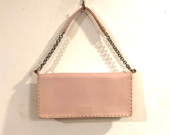 Bijoux - A lovely soft pink smooth leatherette foldover purse with a stylish silver toned chain and pink leatherette strap. Gorgeous color!