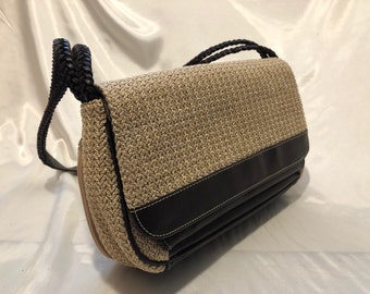 Liz  Claiborne - A classic woven sandy colored foldover bag with dark chocolate trim & a woven zippered "mini" purse/wallet attached in back