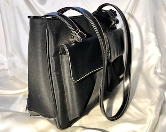 Rosetti - A handsome, practical &quot;designer&quot; black water resistant shoulder bag with black vinyl trim. Practical - for the professional