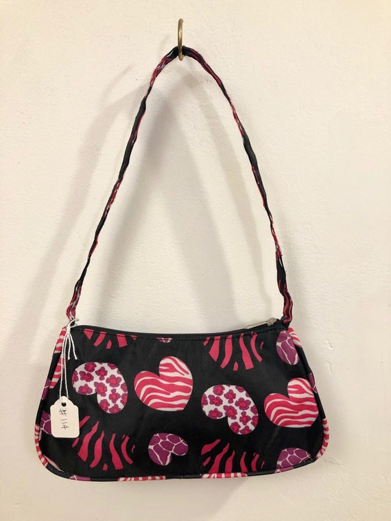 A happy zippered purse with lots of "heart". It's… - image 3