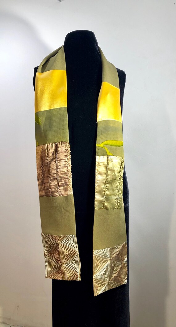 A silken patchwork scarf with a medley of warm to… - image 5