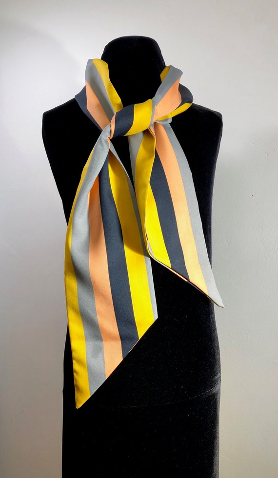 A smooth, chic silken  fully lined "skinny" scarf 