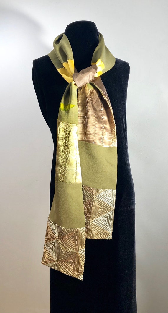 A silken patchwork scarf with a medley of warm to… - image 3