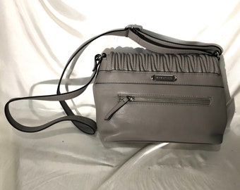 koltov purse with coin organizer Cinosural International School