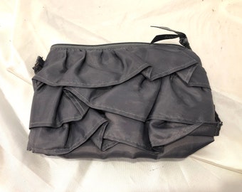 thirty-one - Layers of subtly shiny grey matte satin ruffled fabric embellish this charming clutch - a bit of casual style