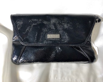 Nine West - A shiny textured black vinyl clutch/shoulder foldover bag with the handsome silver toned metal Nine West logo. Very chic!