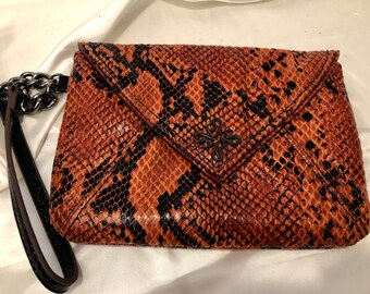 Simply Vera Vera Wang  - A stylish "faux" burnt sienna and black snakeskin envelope clutch / wristlet beautifully designed and crafted