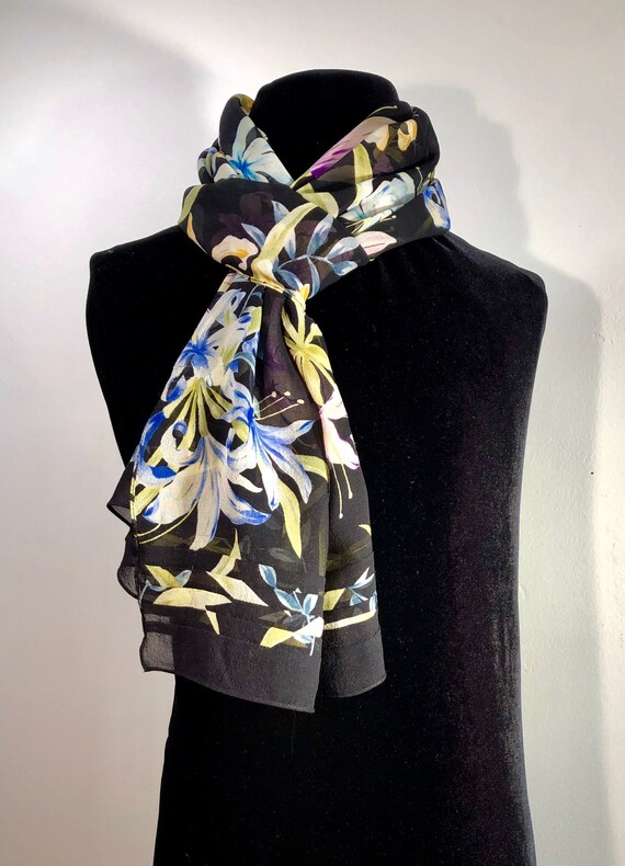 An elegant silken chiffon black scarf with gorgeou
