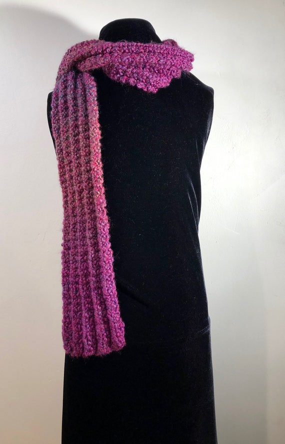 A Handsome loosely knitted thick, textured Scarf w