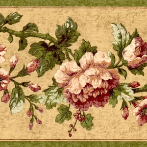 May include: A wallpaper border featuring a repeating pattern of large, deep red and light pink flowers with green leaves and small red berries on a textured, light tan background, framed by thin, solid dark green horizontal stripes.