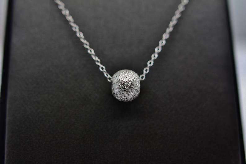 Sterling Silver Laser Cut Ball Pendant Necklace