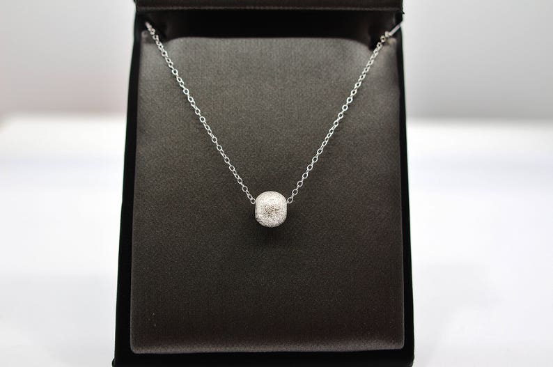 Sterling Silver Laser Cut Ball Pendant Necklace