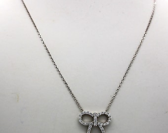 Sterling Silver Diamond Bow Pendant 11x15mm Sterling Silver Diamond Bow Pendant 11x15mm