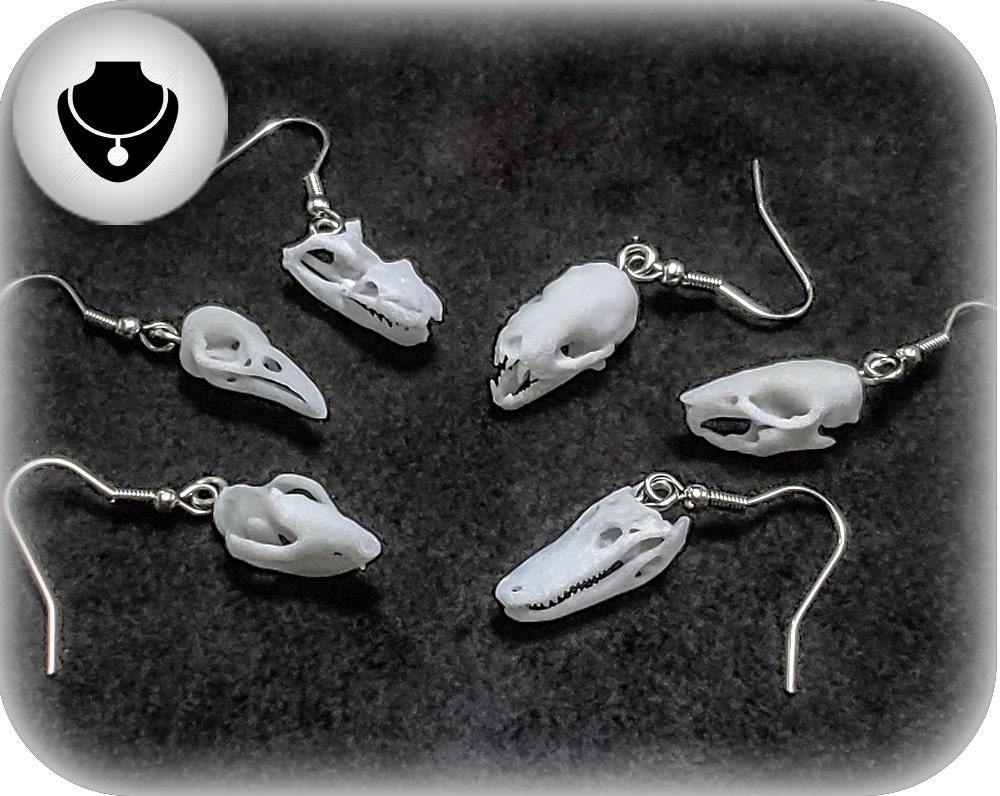 Animal skull earrings deals