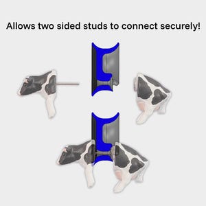 May include: Two black and white cow figurines with a blue connector piece in the middle. The connector piece allows the two figurines to connect securely.  Allows two sided studs to connect securely!