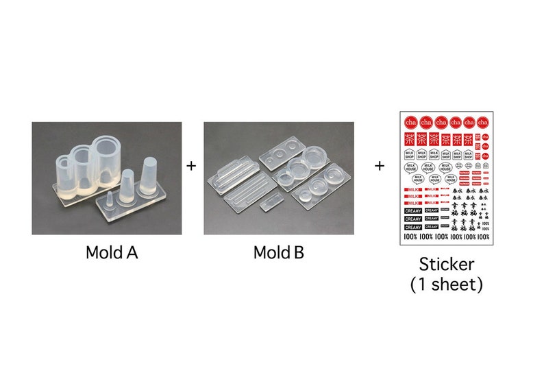 May include: Three clear silicone molds for making miniature food items, including a set of three cylinders, a set of four circles, and a set of three rectangular shapes. A sheet of stickers with various designs, including text in Japanese, is also included.