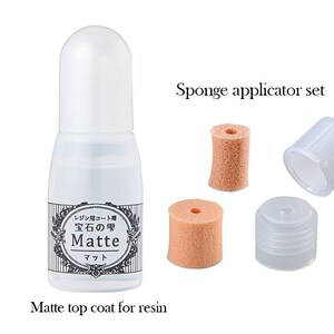 May include: A clear bottle of matte top coat for resin with a white cap, alongside a sponge applicator set. The bottle has Japanese text and the word "Matte". The set includes two sponge applicators and two clear caps.