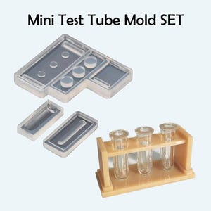 May include: A set of clear silicone molds for making miniature test tubes. The set includes three individual molds for test tubes and a mold for a test tube rack. The rack mold has three slots for test tubes.
