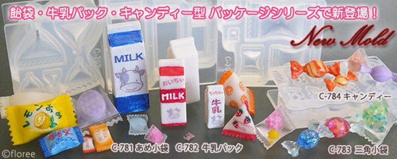 Puede incluir: Un conjunto de moldes de pl&aacute;stico transparente para hacer dulces en miniatura, cartones de leche y bolsas. Los moldes est&aacute;n etiquetados con el texto japon&eacute;s "C-781", "C-782", "C-783" y "C-784". Los moldes est&aacute;n rodeados de dulces en miniatura, cartones de leche y bolsas hechos con los moldes.