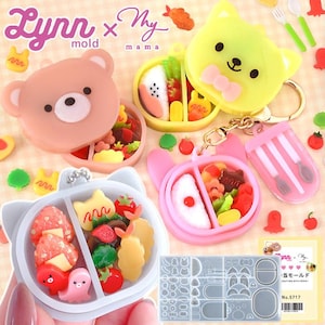 Könnte beinhalten: Eine Sammlung farbenfroher, essensbezogener Accessoires und Formen. Das Bild zeigt bären- und katzenförmige Behälter, die mit Miniatur-Lebensmitteln gefüllt sind, sowie eine Form zur Herstellung ähnlicher Designs. Der Text "Lynn x My mama" ist sichtbar.