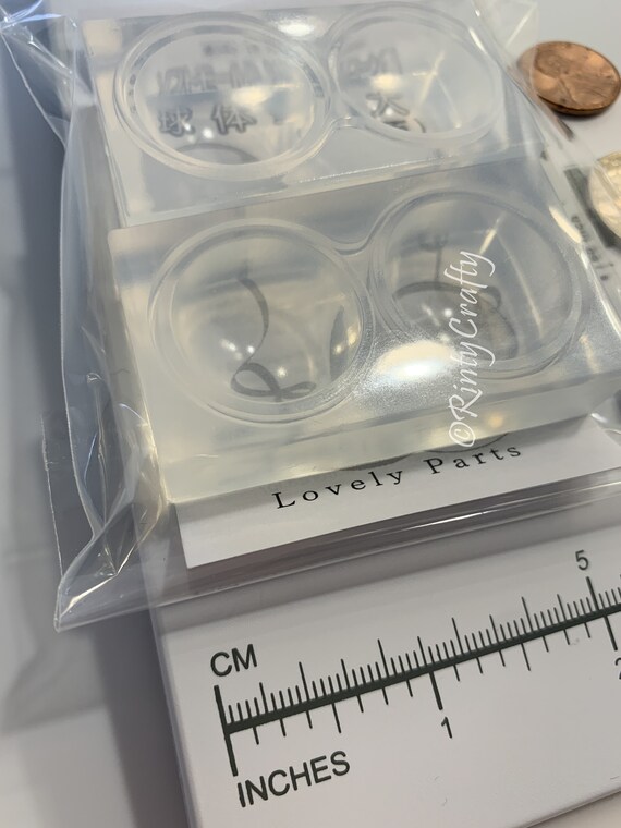 Two-part clear silicone sphere mold - great for making resin paperweights