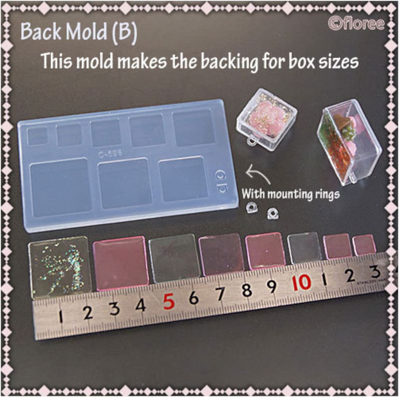 May include: A clear silicone mold with eight square cavities for making box backs. The mold is labeled "Back Mold (B)" and "0-585". A ruler is shown with measurements in inches. The mold is used to create the backing for box sizes.