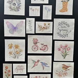 May include: A selection of small, rectangular fabric patches featuring spring-themed illustrations. Designs include a birdhouse, bunny, flowers, butterfly, bicycle, birds, and the text "Hello Spring". The colour palette features pastels and natural tones.
