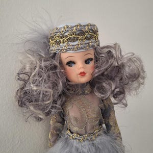 Sindy Pedigree, OOAK, customized , rerooted, in lace and feather designers outfit. 11 inch art doll .