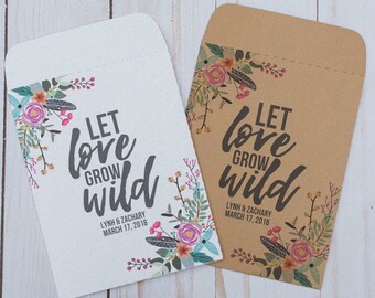 May include: Two white and brown paper envelopes with a floral design and the text "Let love grow wild" with the date and names of the couple.
