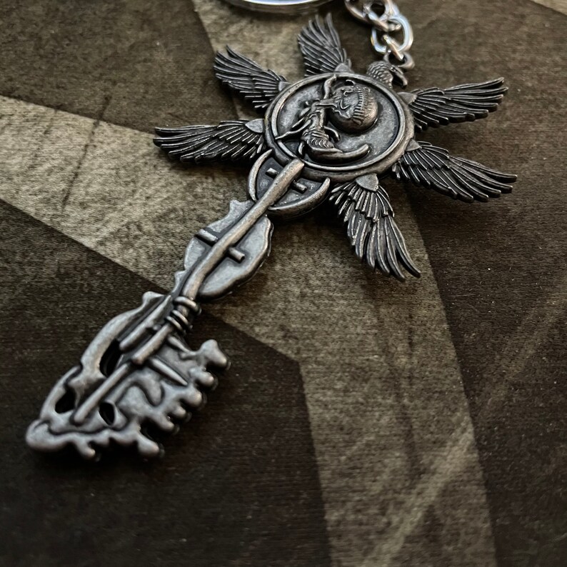 Resident Evil 8 RE8 Village Sixwinged Unborn Key Keychain Etsy