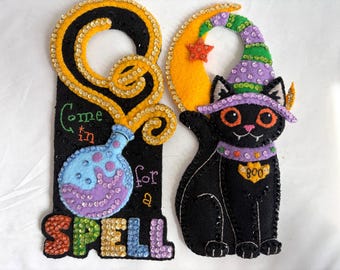 Finished BUCILLA Halloween “Spellbound Greetings” DOOR HANGERS Set of 2 | Felt + Embroidered + Sequined 4-1/2” x 10” Black Cat & Spell