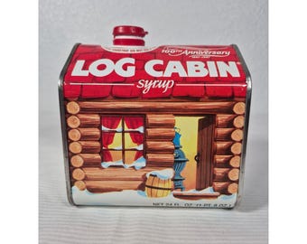 Lata de metal coleccionable de Log Cabin Syrup, edición del centenario (1887-1987).