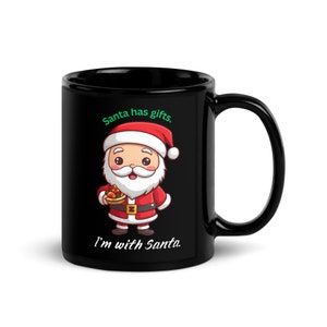 Santa&#39;s Sidekick: Santa Has Gifts Black Mug