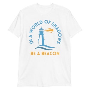 In a World of Shadows, be a Beacon T-Shirt