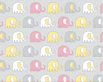 May include: A repeating pattern of cartoon elephants in white, pink, yellow, and gray on a light gray diamond-patterned background. The elephants have large ears and trunks. The ruler at the bottom measures up to 7 inches.