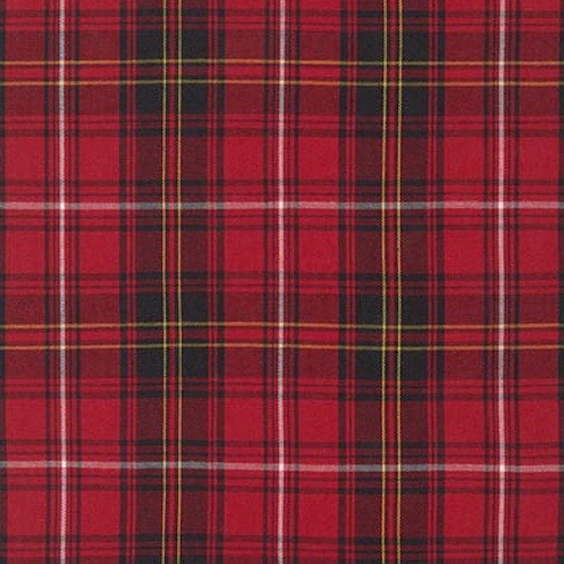 May include: A close-up of a red plaid fabric with black, white, and yellow lines. The pattern is a classic tartan design, with intersecting vertical and horizontal stripes creating a grid-like appearance. The fabric has a woven texture.