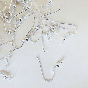 50 light silver hook holders for light silver-colored metal earrings image 1