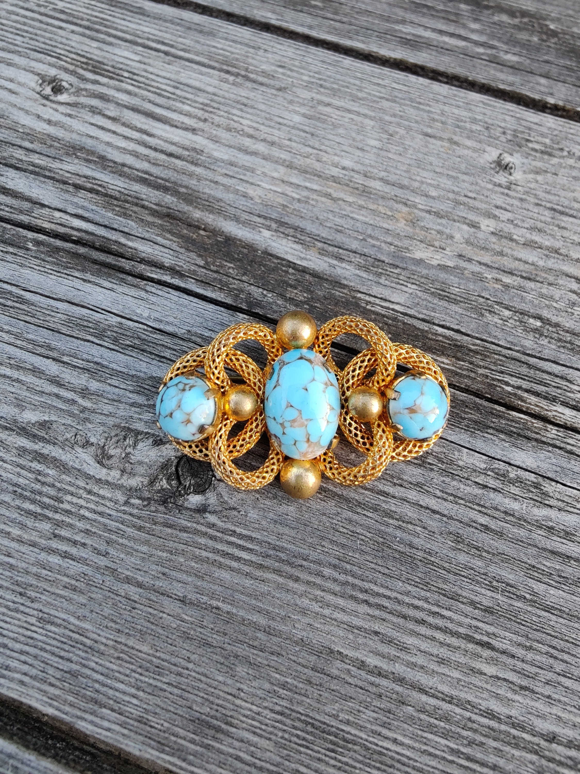 Neiger era brooch, Art Deco brass and rhinestone brooch