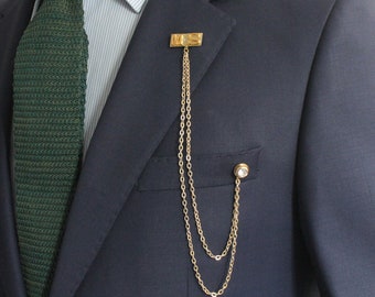 long chain brooch